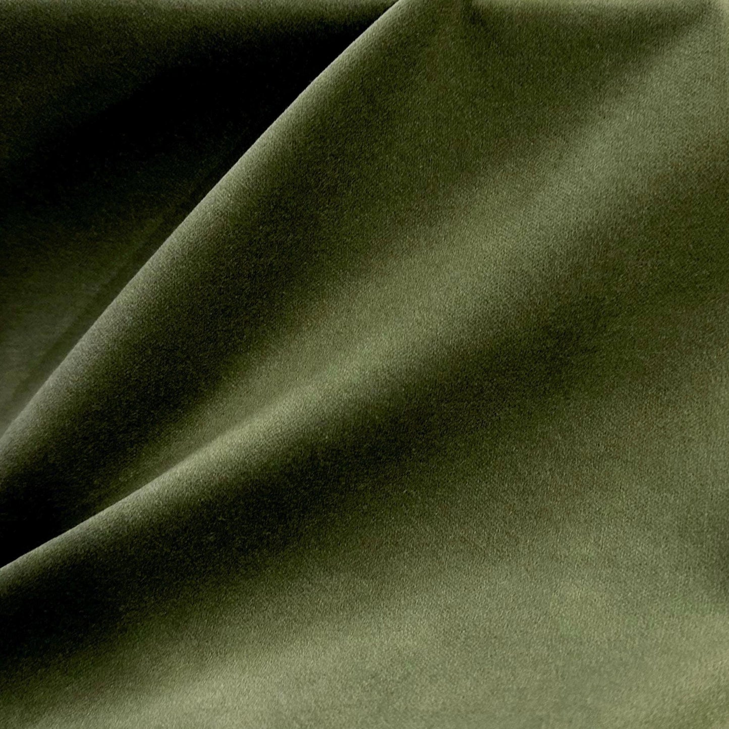 a close up view of a green fabric