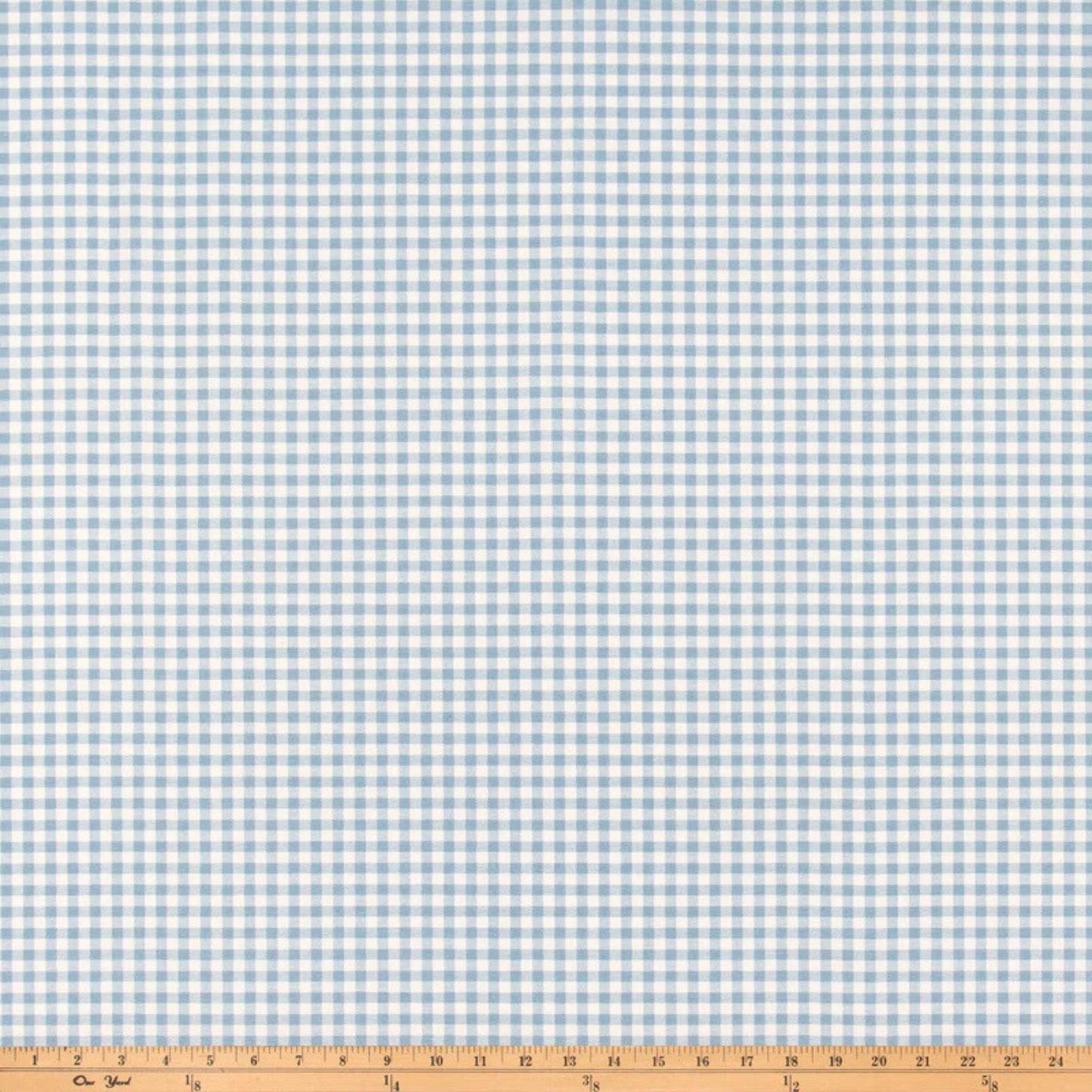 a blue and white checkered fabric with a ruler