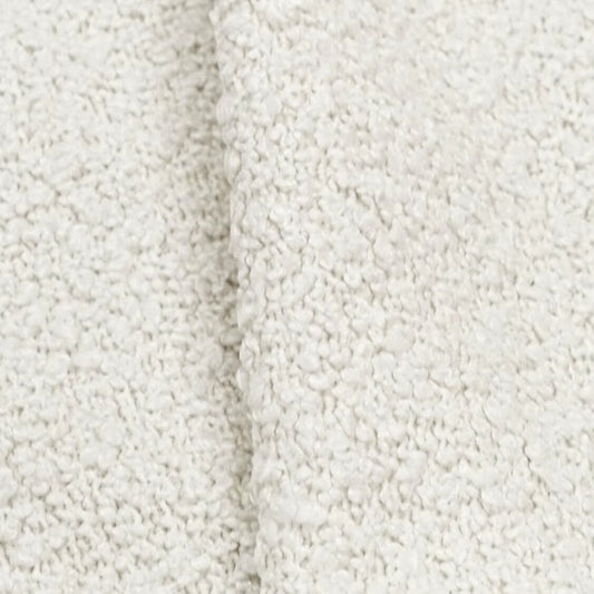 A close-up image of a white, fluffy fabric with a textured appearance.