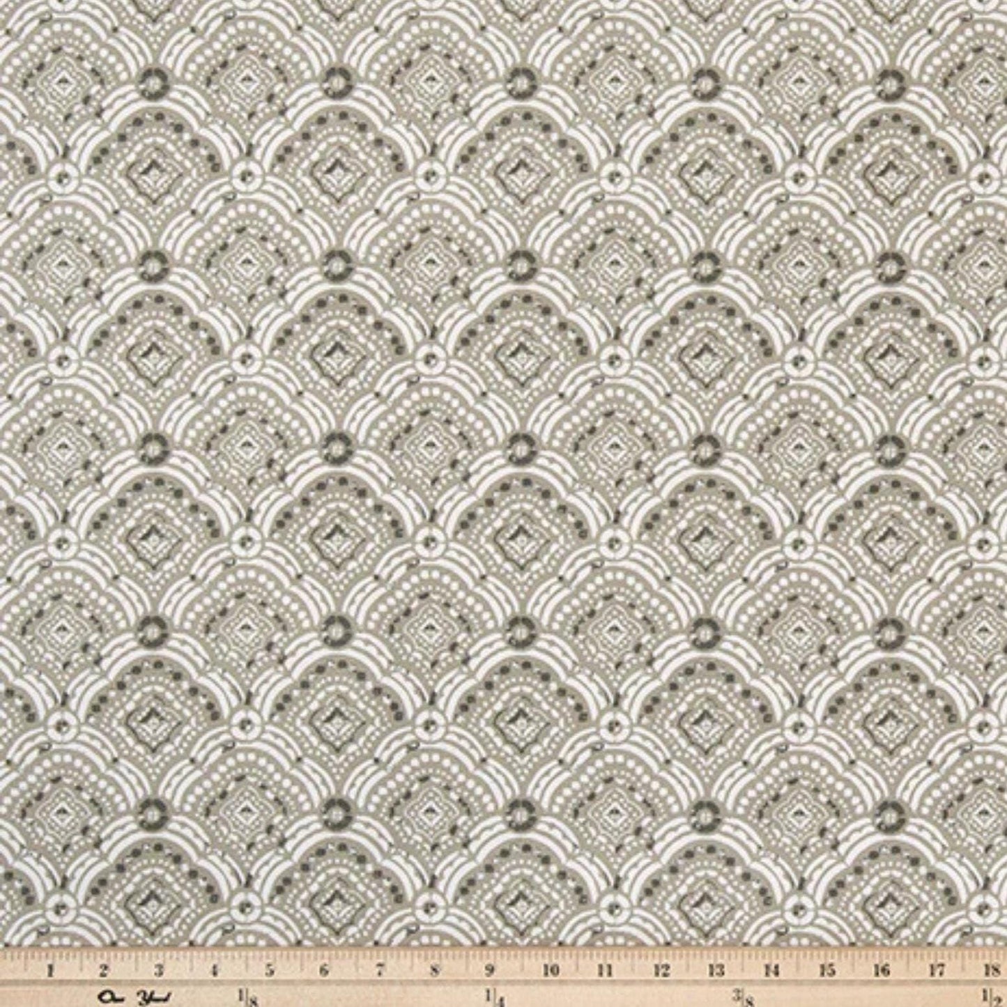 a ruler with a white and gray pattern on it