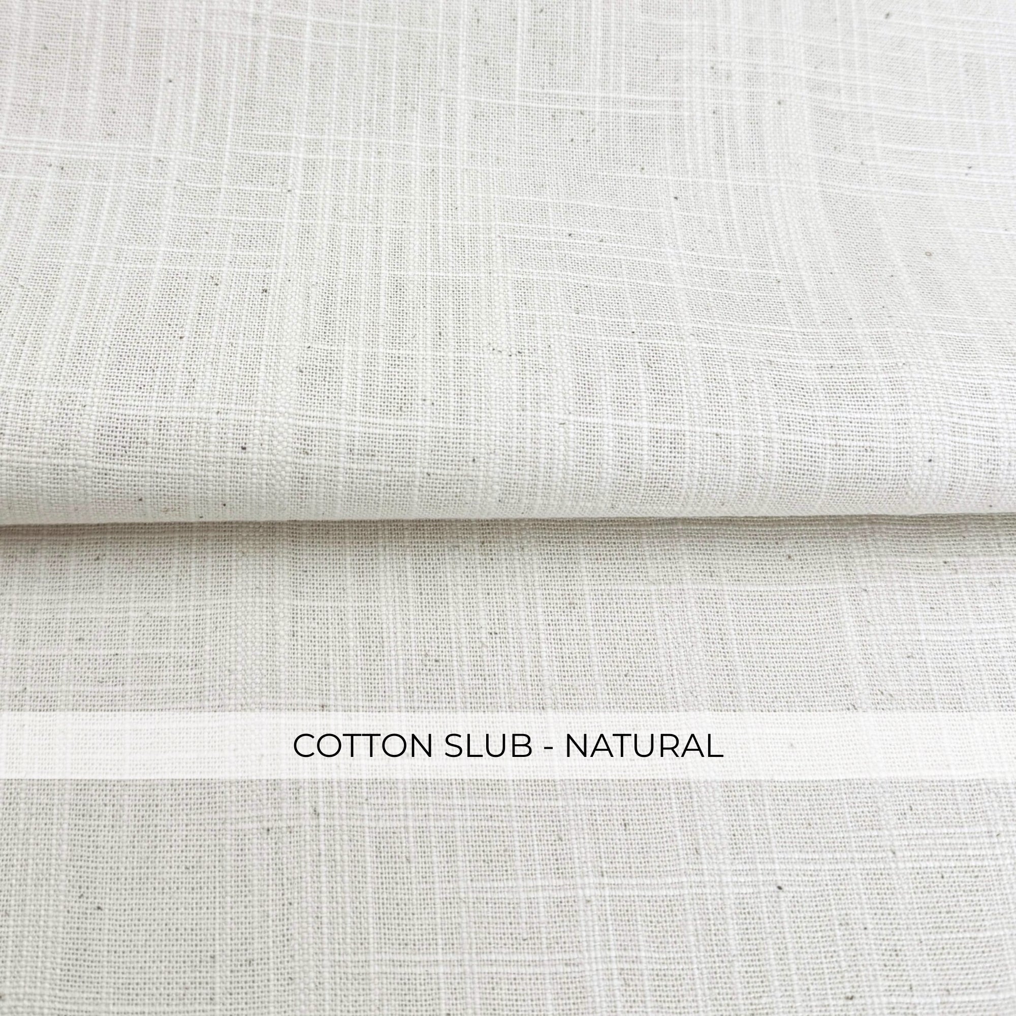 a close-up view of a fabric with a textured, natural-looking appearance.