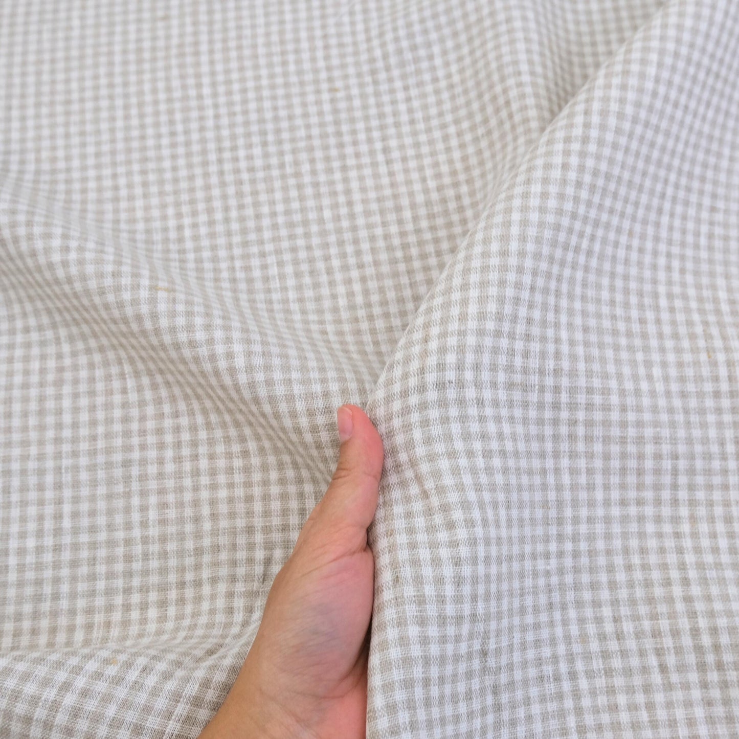 Neutral gingham fabric detail showing rustic farmhouse style checks