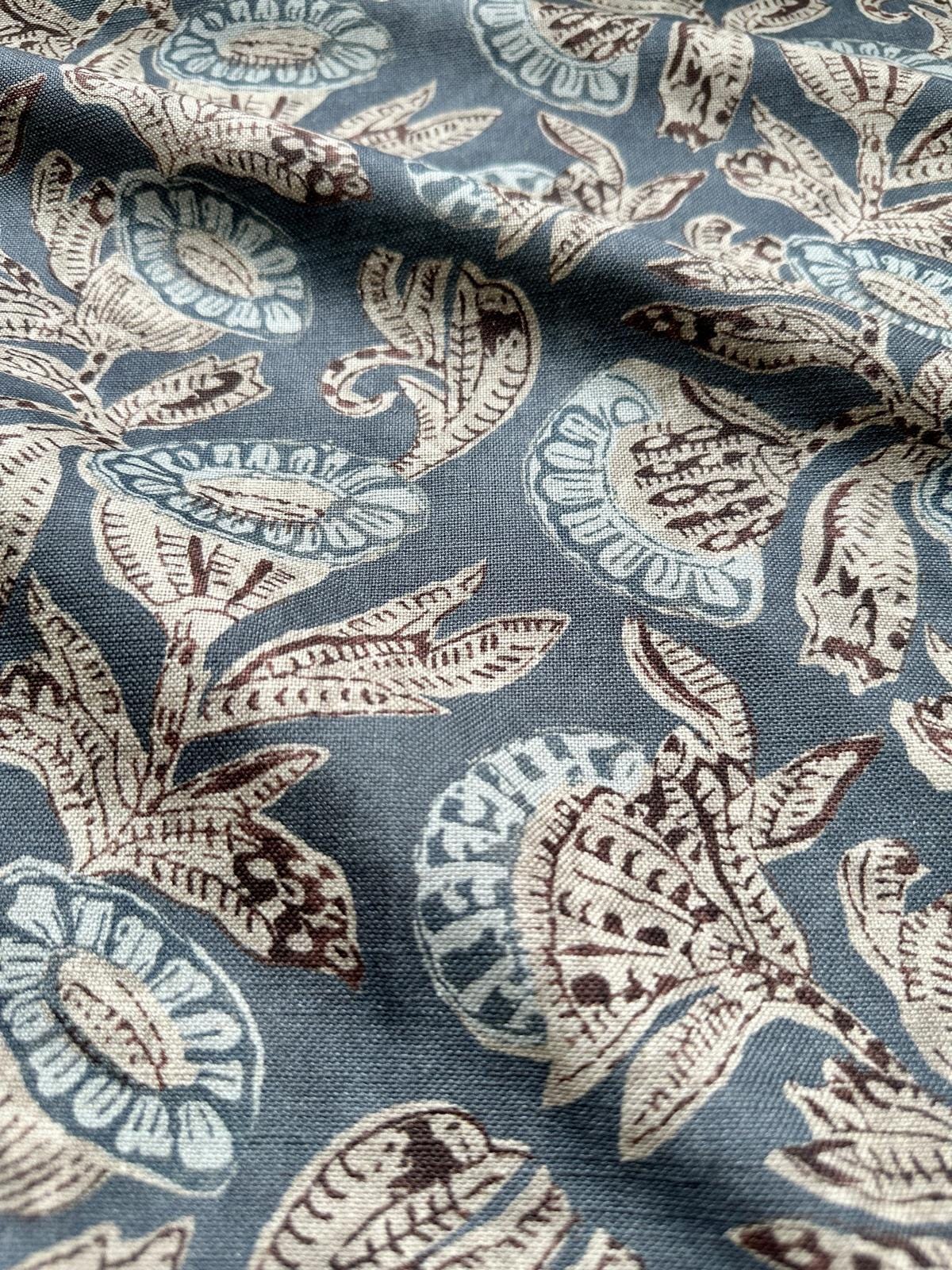 a blue and brown floral print fabric