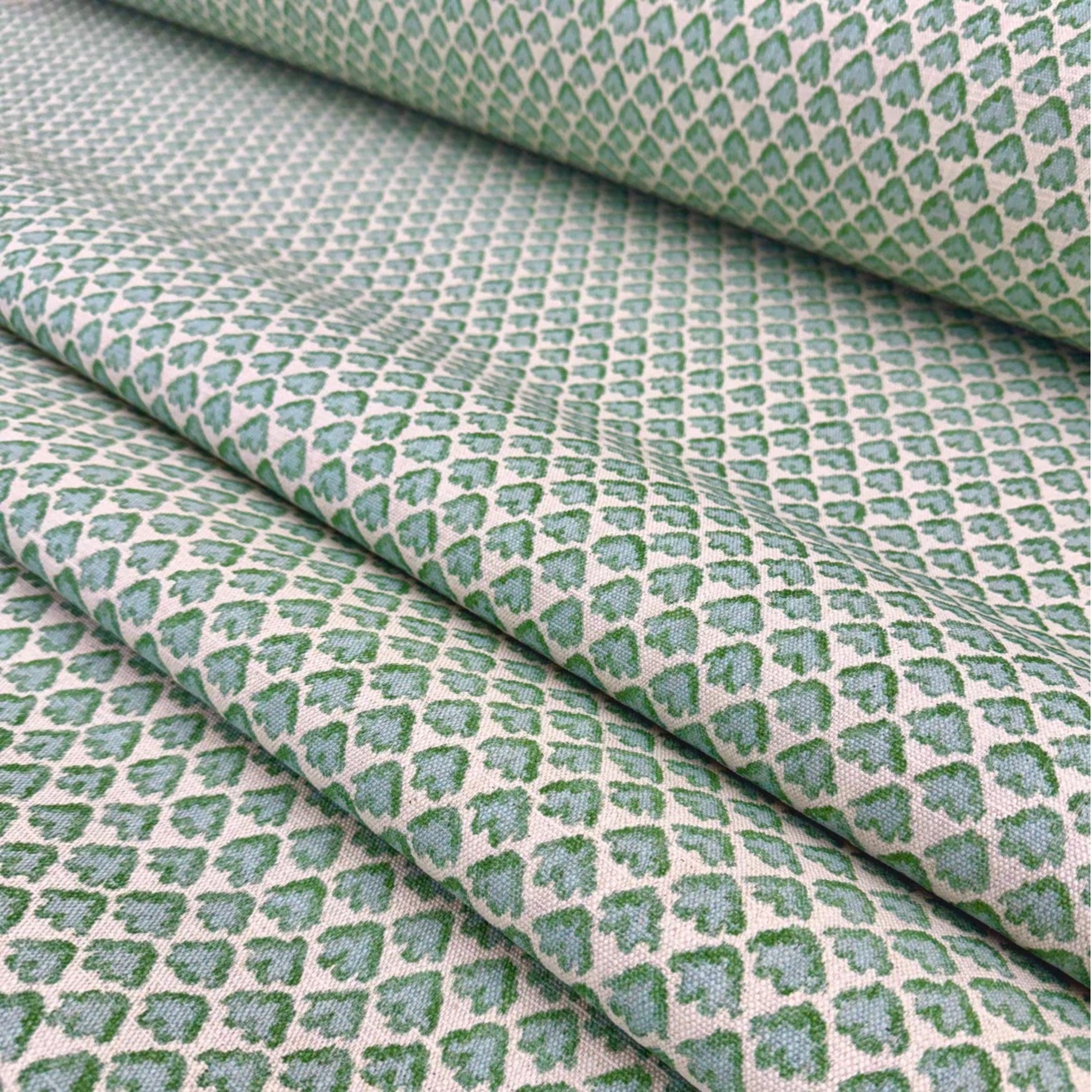 Blue green botanical motif fabric with small scale repeating pattern