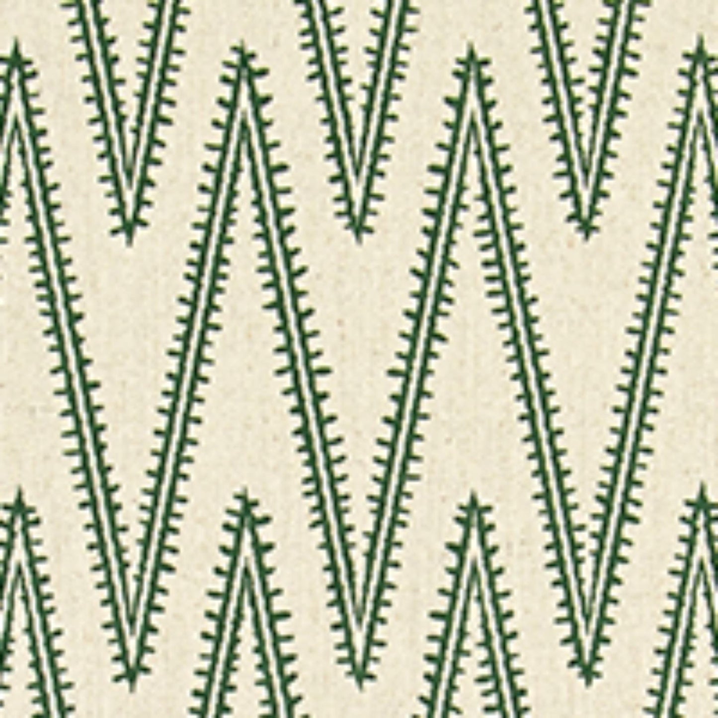 a repeating pattern of green and white triangles arranged in a zigzag design.