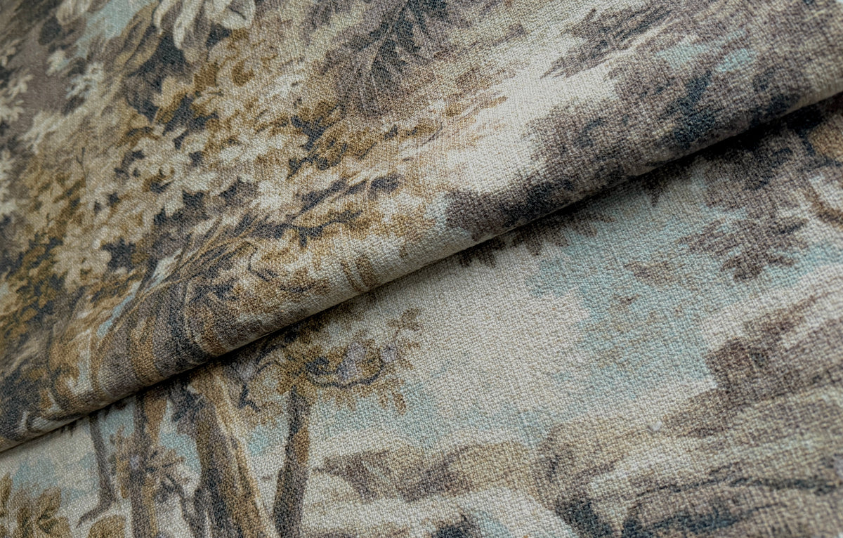 Close-up of Arcadian Fog fabric showing the toile pattern detail in taupe and light blue