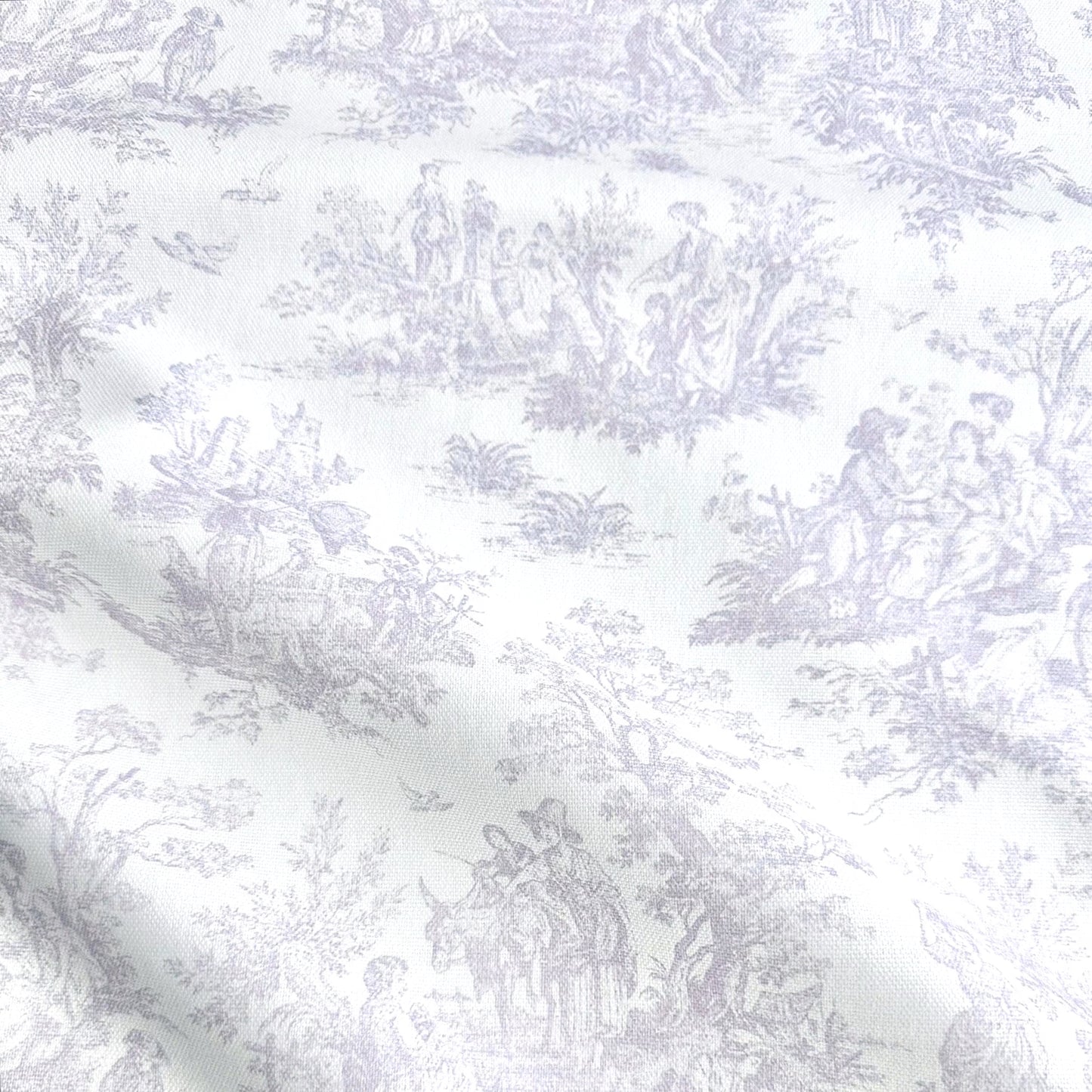 The image is a close-up of a fabric with a repeating pattern of a landscape scene, featuring people, animals, and various elements such as trees, flowers, and birds. The pattern is predominantly white, with some gray accents. The fabric appears to be made of a soft, plush material, suitable for clothing or home decor.