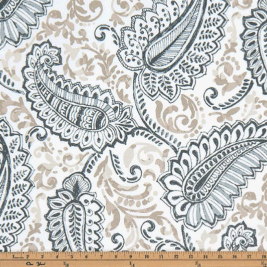 a white and blue paisley print fabric with a ruler