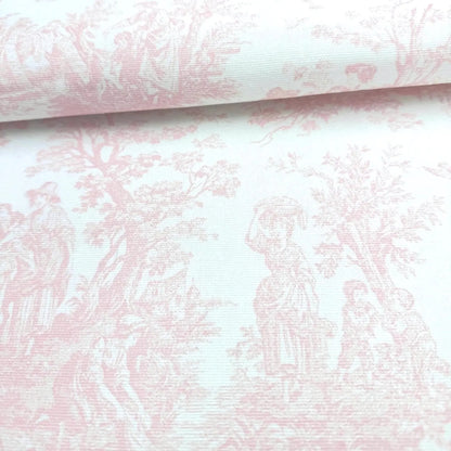a close-up view of a pink and white fabric with a repeating pattern of a woman and a child, along with other figures and trees.