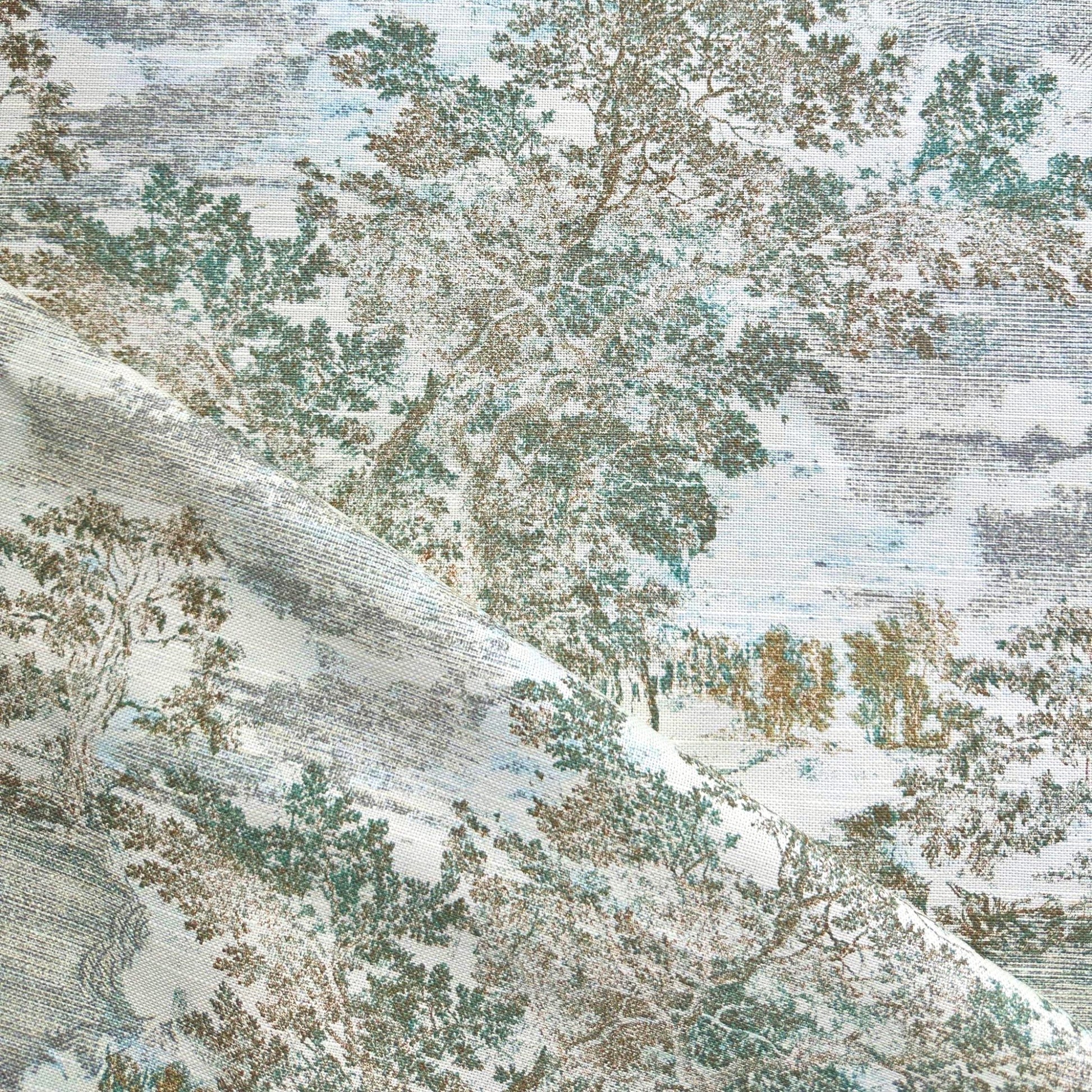 The image is a close-up of a fabric with a pattern of trees and foliage in various shades of green, blue, and brown. The fabric appears to be a type of wallpaper or textile with a textured, natural-looking design.