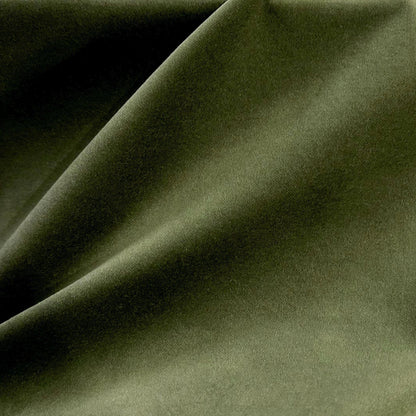 a close up view of a green fabric