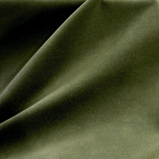 a close up view of a green fabric