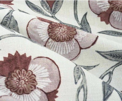Dusty rose floral fabric with maroon detail designed for soft bedroom curtain enhancing cozy living space