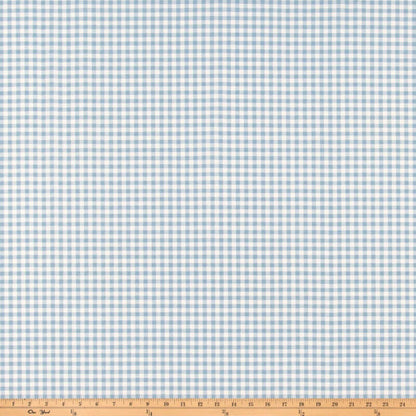a blue and white checkered fabric with a ruler