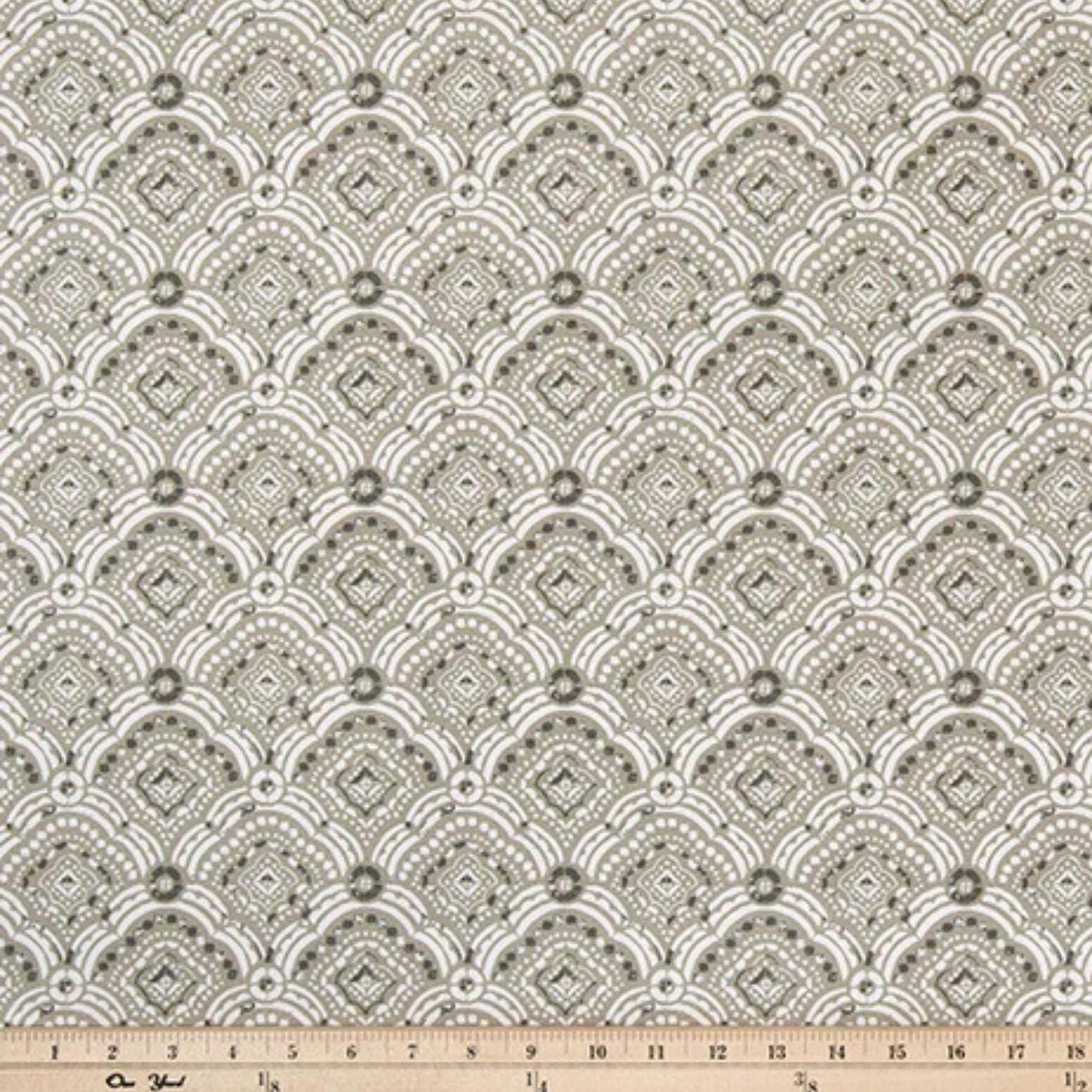 a ruler with a white and gray pattern on it