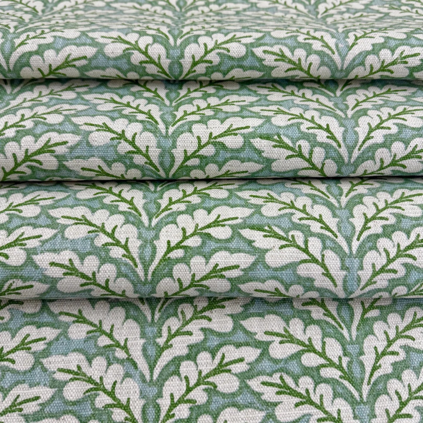Backside of green decorative upholstery fabric
