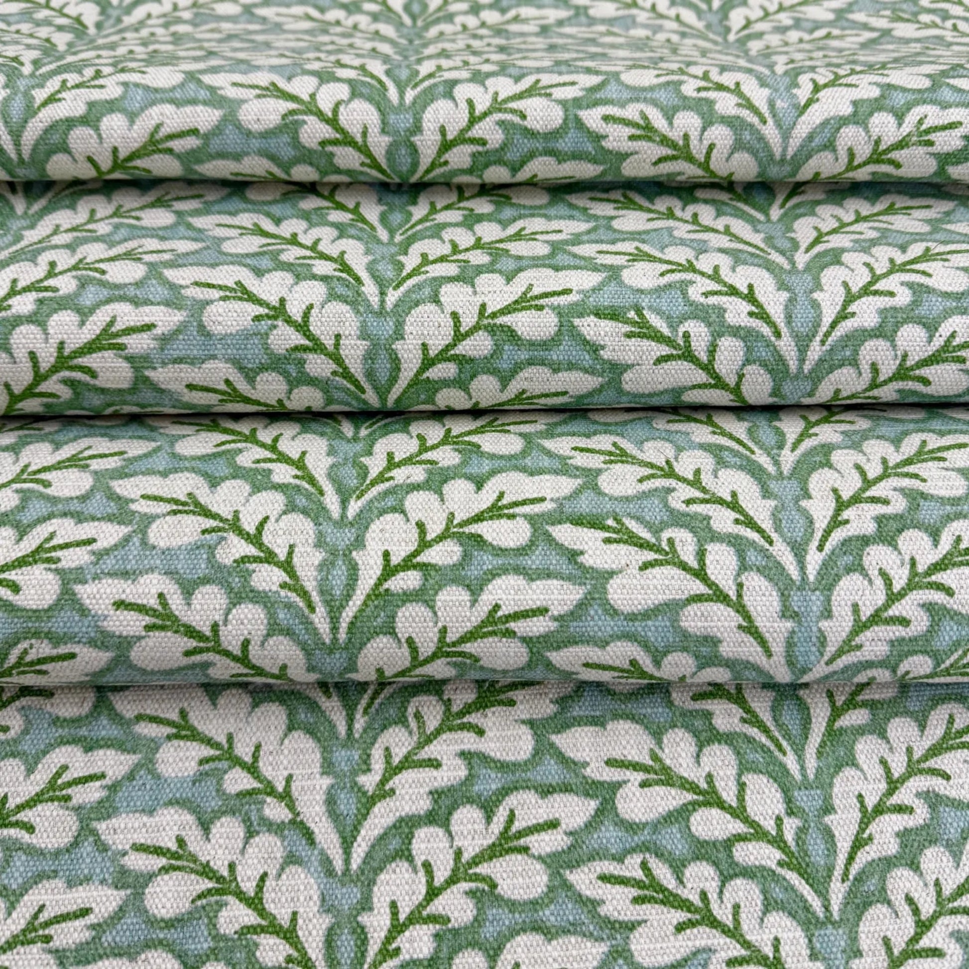 Backside of green decorative upholstery fabric