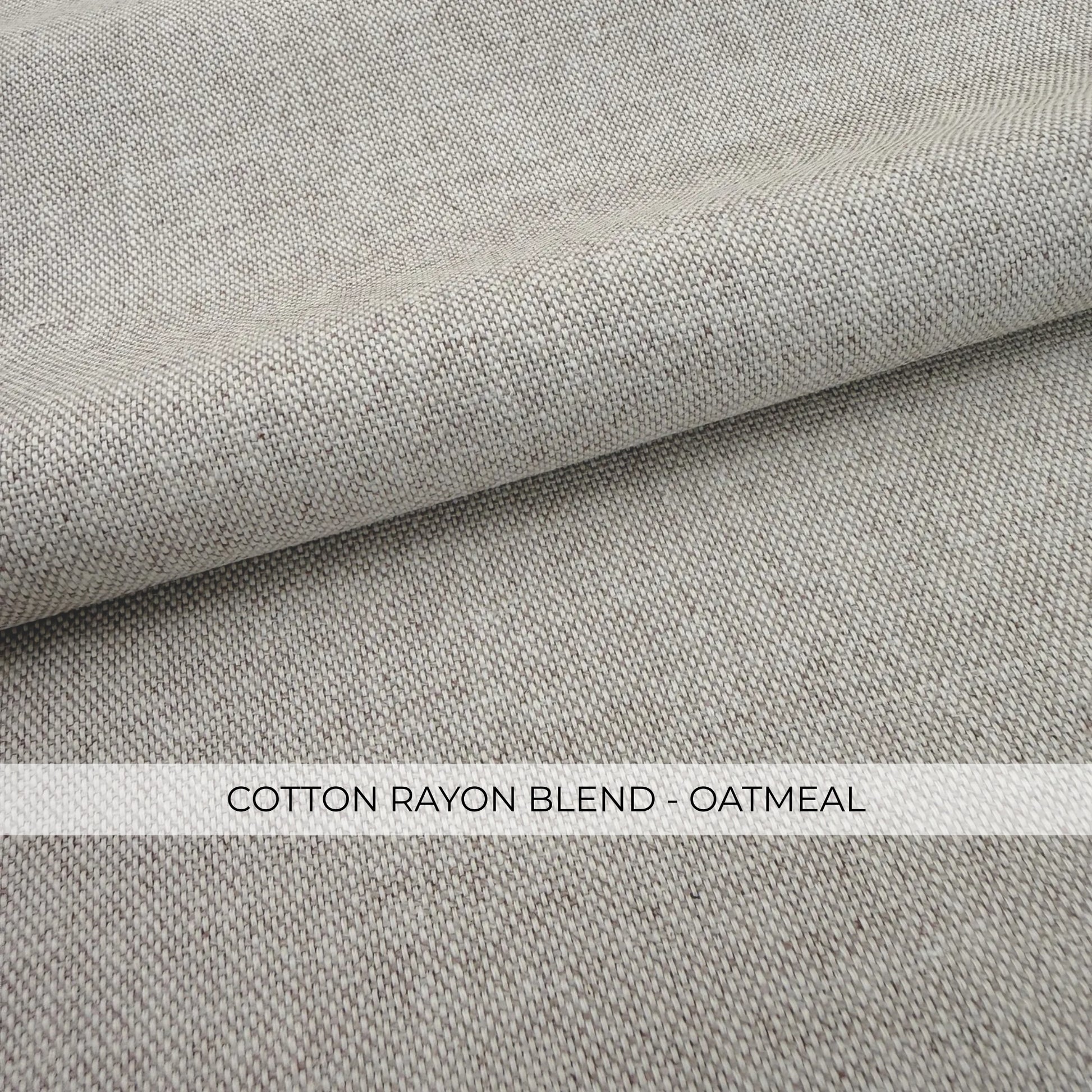 a close-up view of a fabric with a textured, woven appearance. The fabric appears to be a blend of cotton and oatmeal, as indicated by the text "COTTON RAYON BLEND - OATMEAL" in the image.