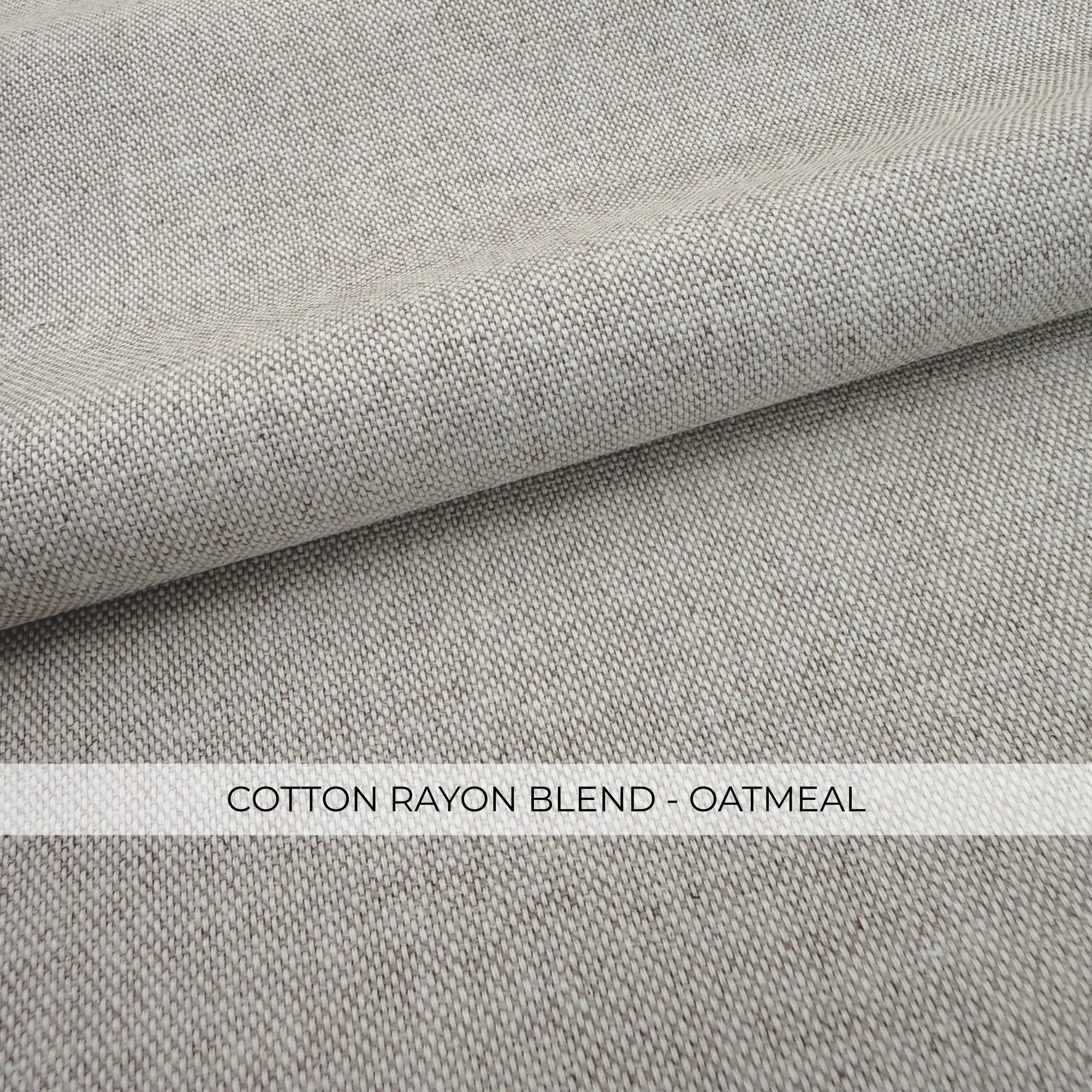 a close-up view of a fabric with a textured, woven appearance. The fabric appears to be a blend of cotton and oatmeal, as indicated by the text "COTTON RAYON BLEND - OATMEAL" in the image.