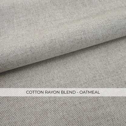 a close-up view of a fabric with a textured, woven appearance. The fabric appears to be a blend of cotton and oatmeal, as indicated by the text "COTTON RAYON BLEND - OATMEAL" in the image.