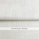 a close-up view of a fabric with a textured, natural-looking appearance.
