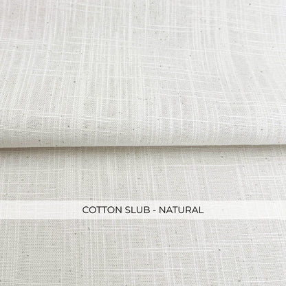 a close-up view of a fabric with a textured, natural-looking appearance.