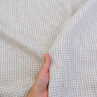 Neutral gingham fabric detail showing rustic farmhouse style checks