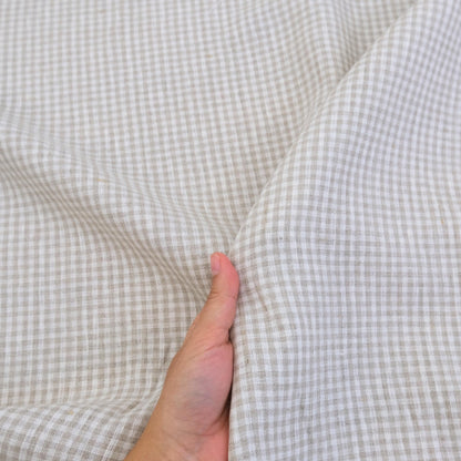 Neutral gingham fabric detail showing rustic farmhouse style checks