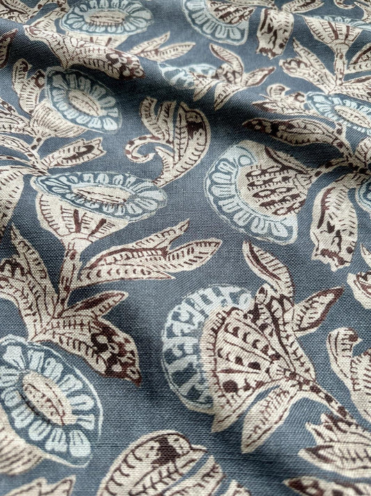 a blue and brown floral print fabric