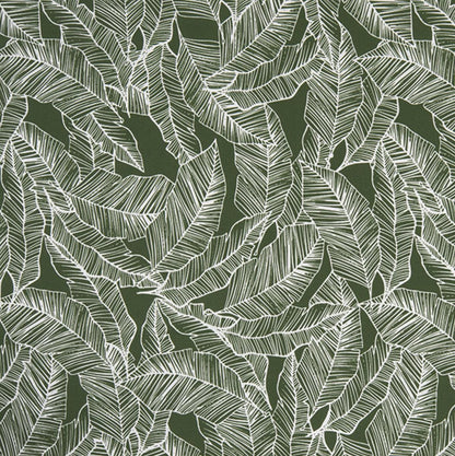 Green fabric featuring layered tropical banana leaf botanical design