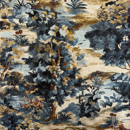The image is a detailed tapestry or fabric with a lush, colorful landscape featuring a variety of trees, flowers, and foliage in shades of blue, green, and brown.