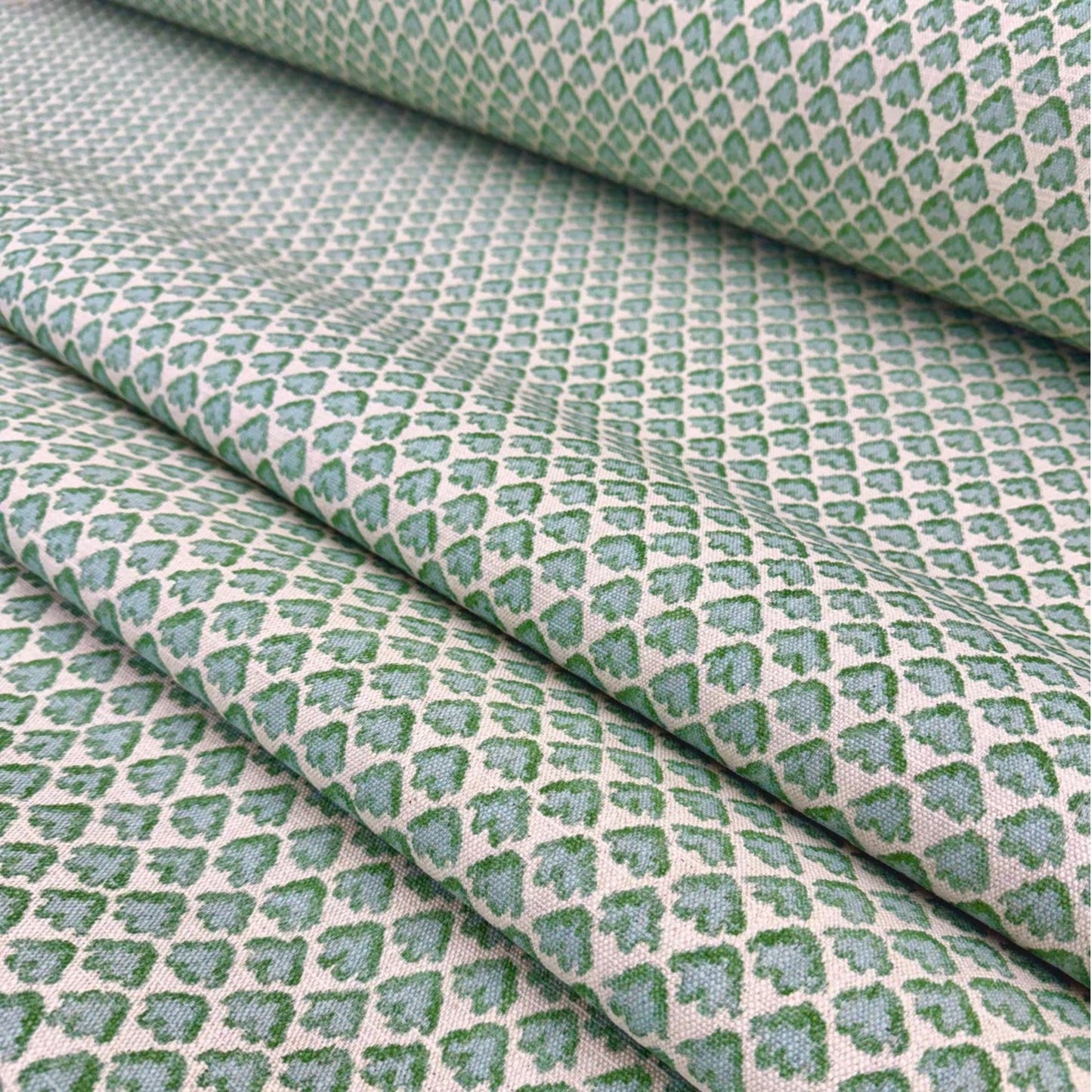 Blue green botanical motif fabric with small scale repeating pattern