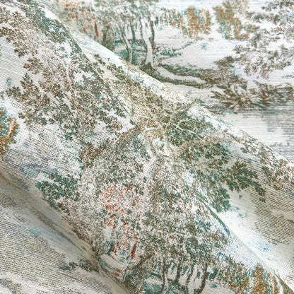 The image is a close-up of a fabric with a detailed pattern of trees and foliage, including a landscape scene.