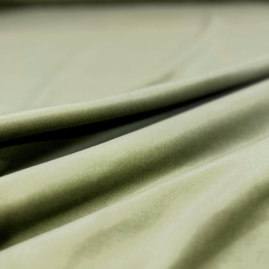 Sage green cotton velvet fabric by the yard. Soft velvet textiles for pillows and crafts.