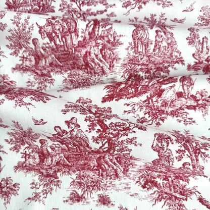 The image is a close-up of a fabric with a repeating pattern of red and white illustrations depicting people and animals in various outdoor scenes.