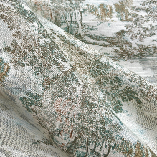 The image is a close-up of a fabric with a pattern of trees and foliage, including a snowy landscape. The fabric appears to be made of a material with a textured, woven appearance.