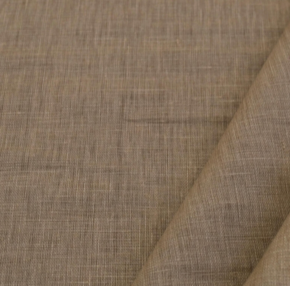 a close-up view of a fabric with a textured, woven appearance.