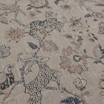 Beige fabric with a repeating pattern of stylized animals and floral elements. The design features tigers, deer, and birds interspersed with large, ornate flowers and foliage in shades of brown and gray. The fabric has a textured appearance.