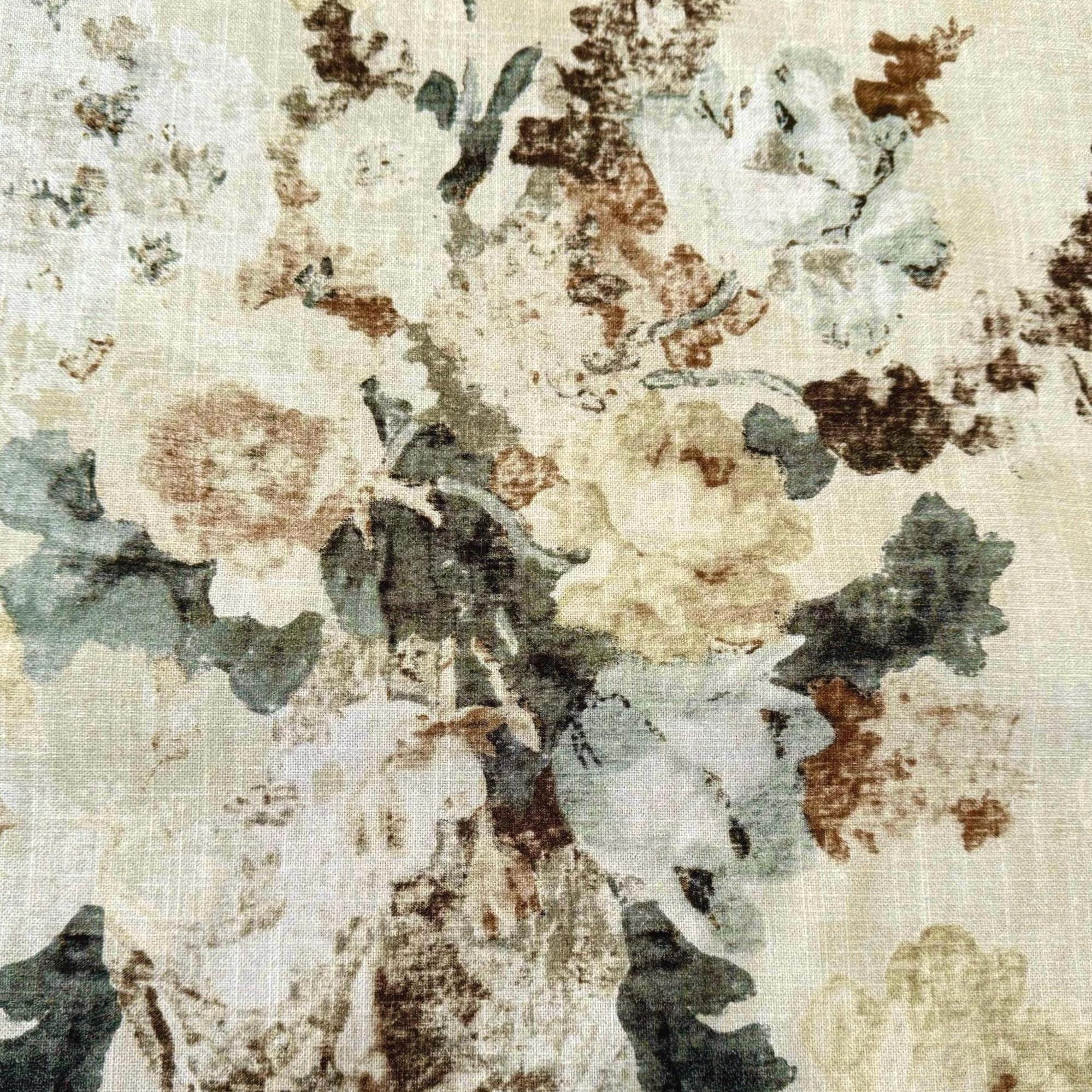 The image is a close-up of a fabric with a floral pattern, featuring a mix of green, brown, and white colors.
