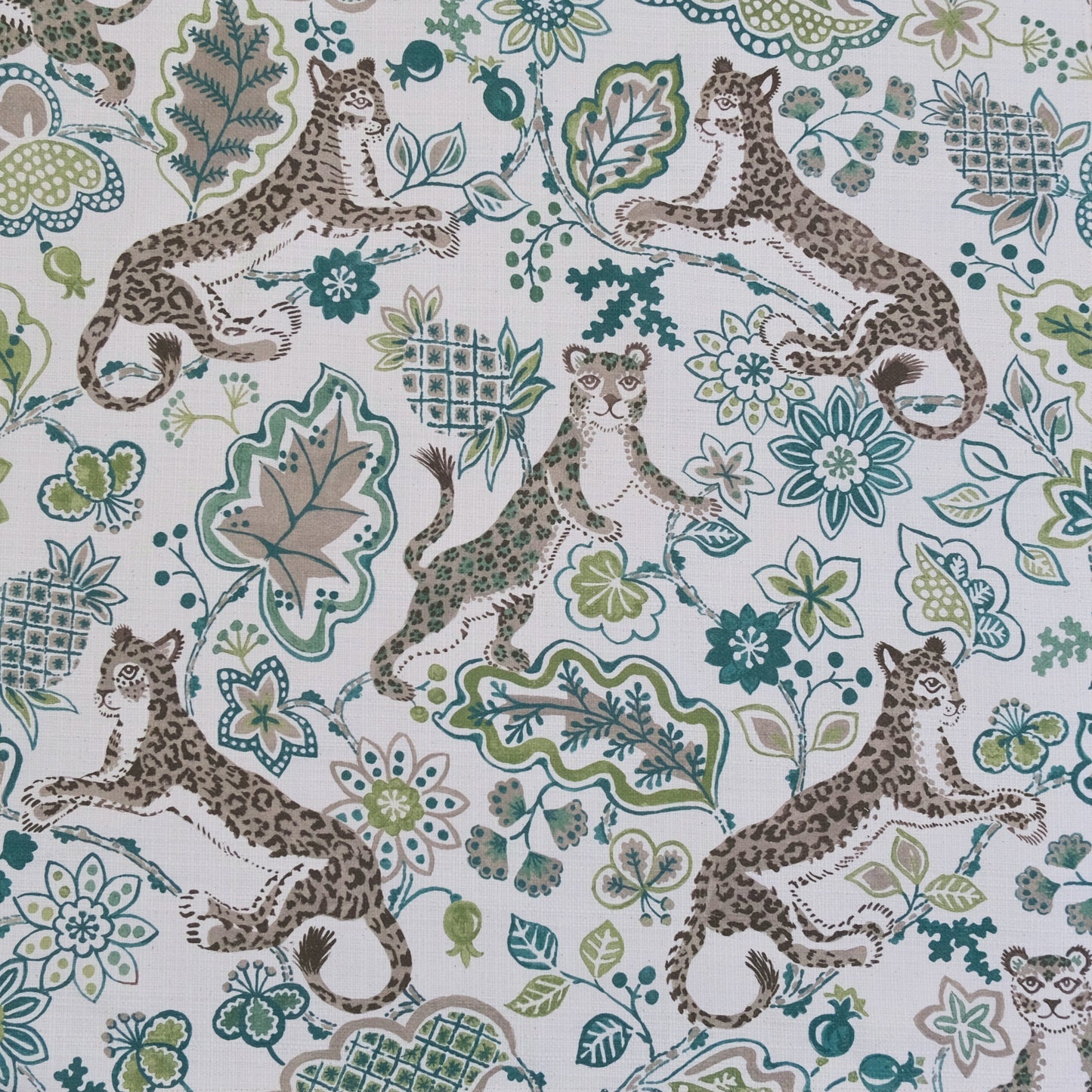 Green animal print floral fabric close up texture Interior decor fabric leopard floral design