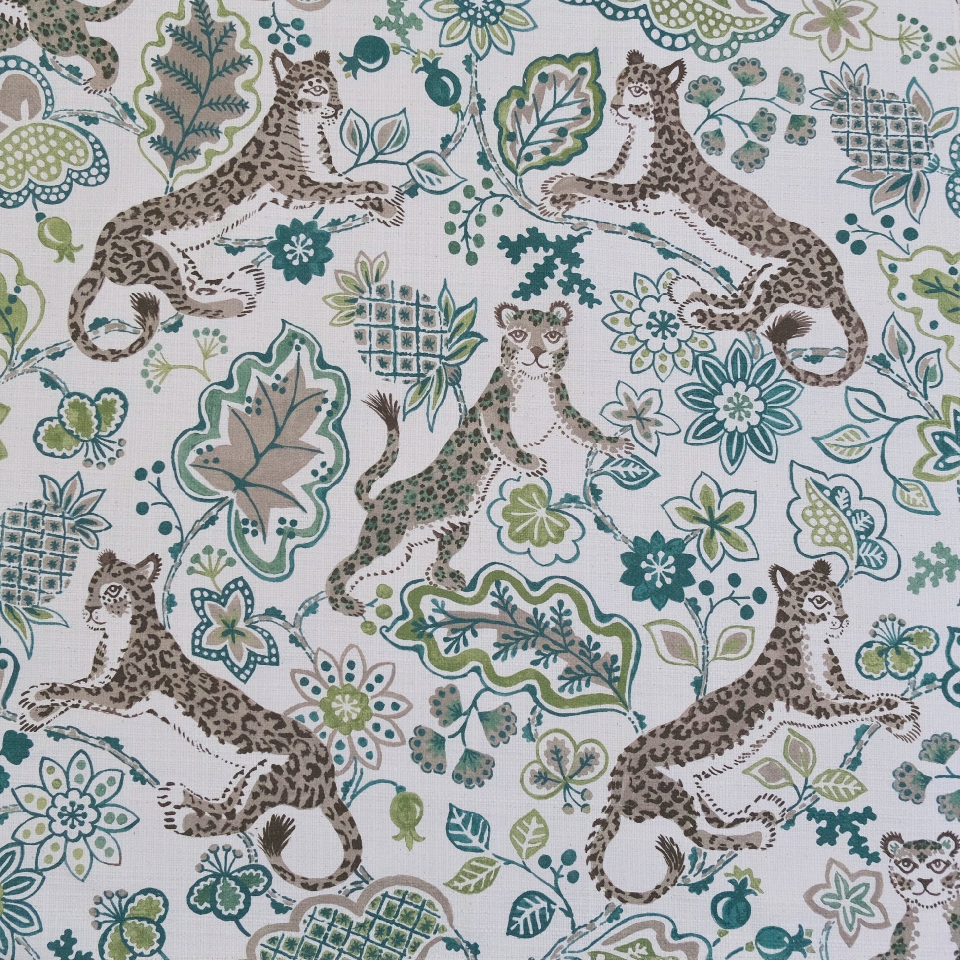 Green animal print floral fabric close up texture Interior decor fabric leopard floral design