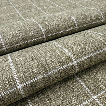 a close-up view of a textured fabric with a checkered pattern, featuring a repeating diagonal grid of white lines.
