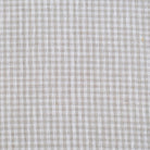 Beige gingham fabric with small neutral checks, cotton linen texture