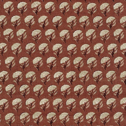 a repeating pattern of brown and white flowers or leaves on a red background.