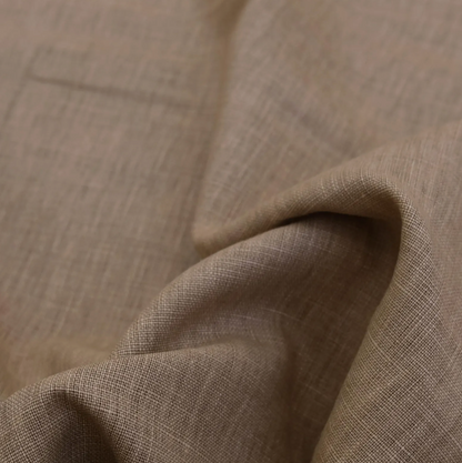 a close-up view of a fabric with a textured, crumpled appearance.