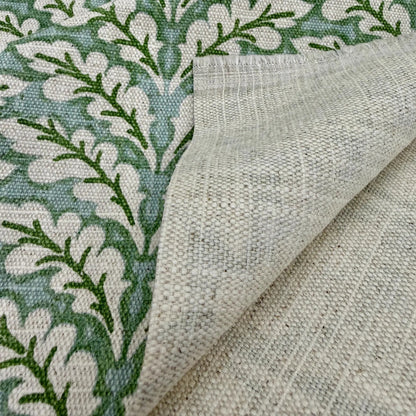 Green leaf pattern fabric close up texture