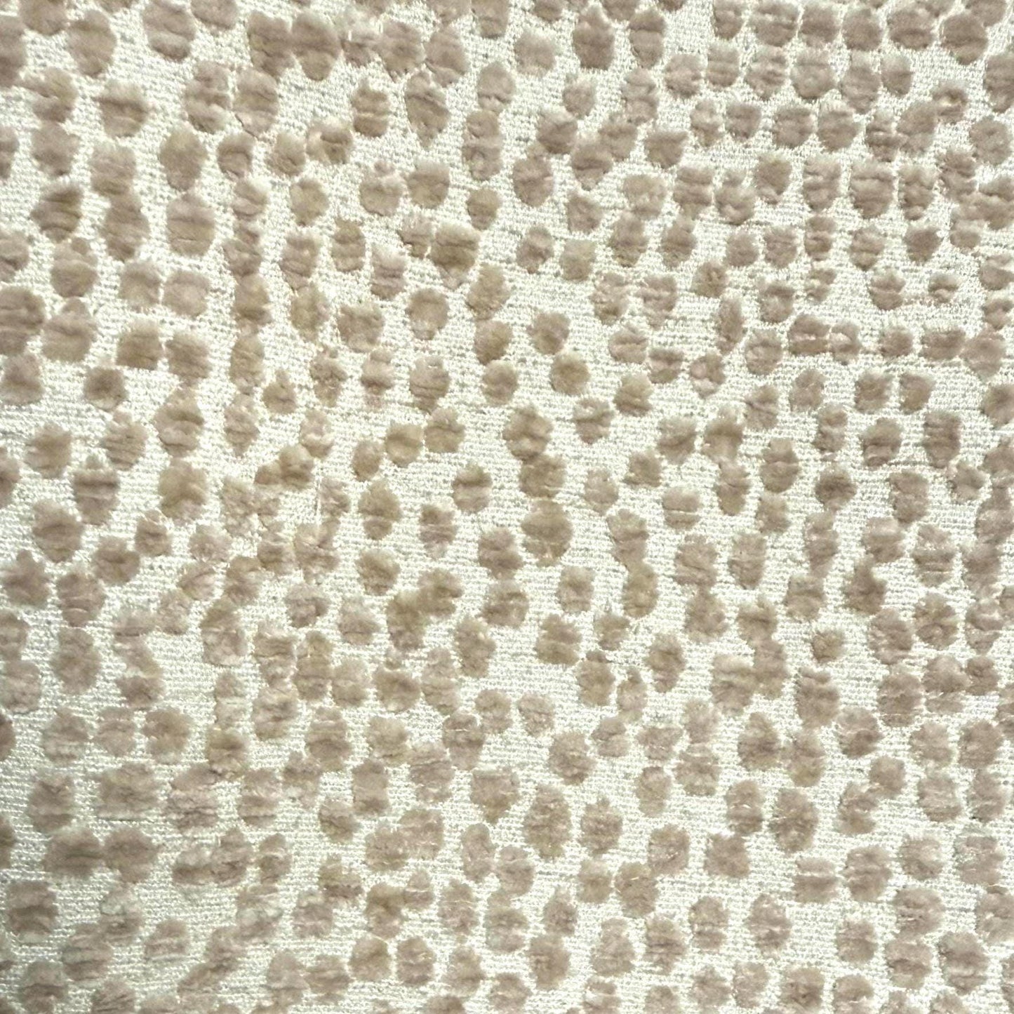 a brown and white animal print fabric
