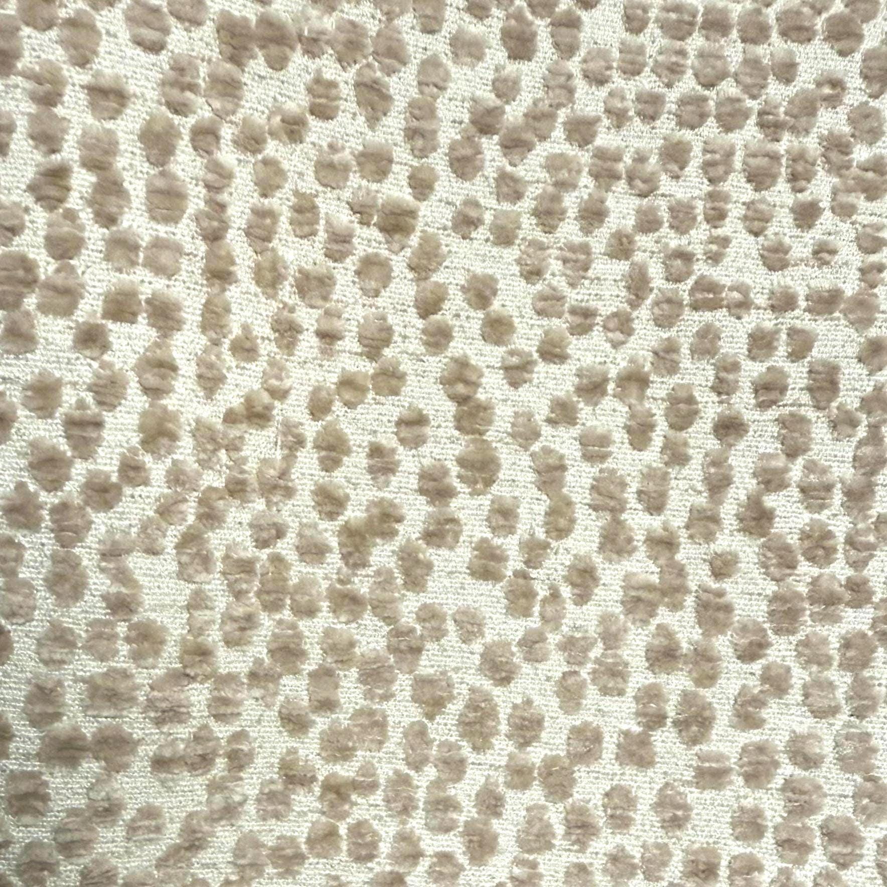 a brown and white animal print fabric