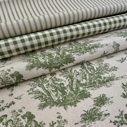 a close-up view of a fabric with a repeating pattern of green and white checkered and floral designs.