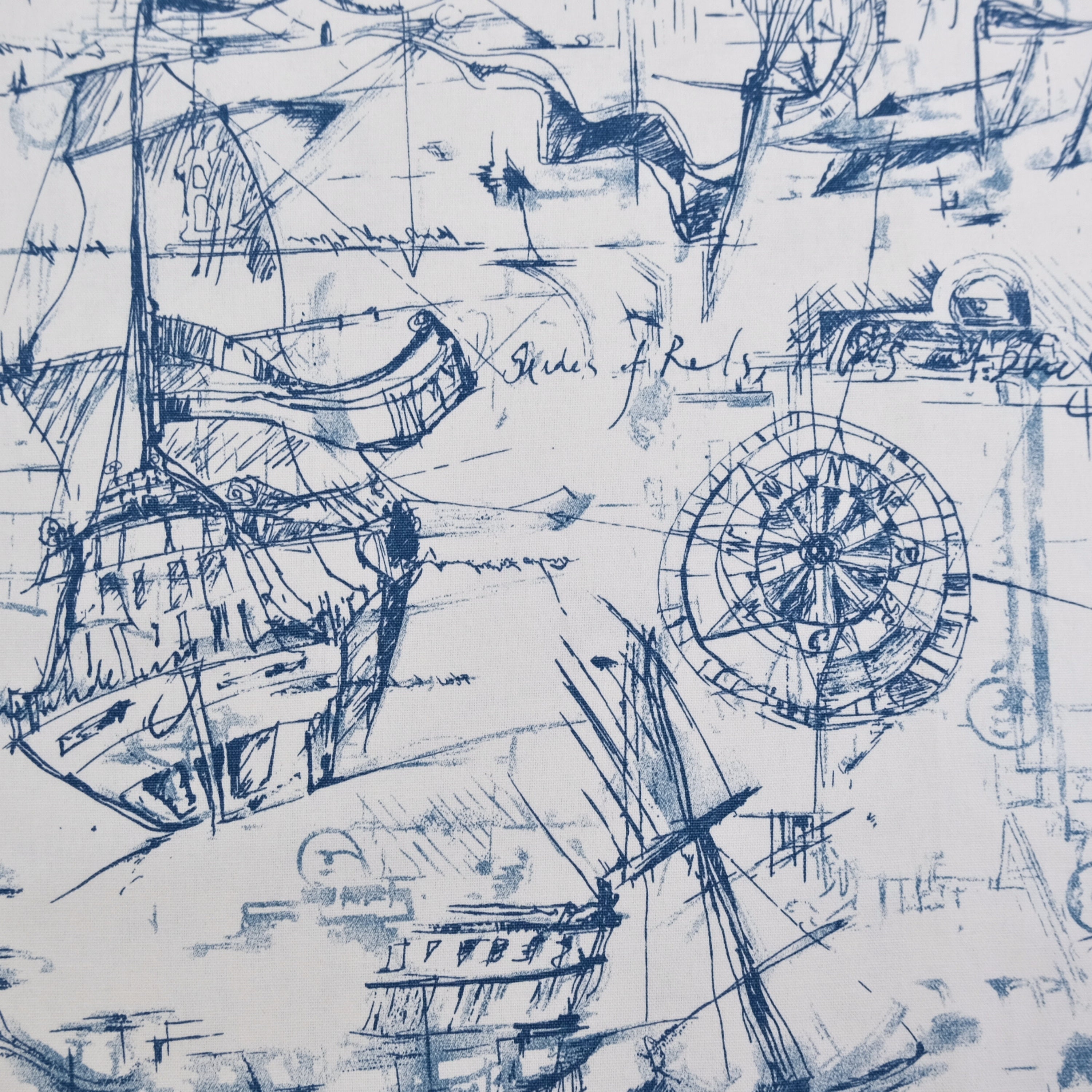 a collage of various sketches and drawings of ships, including a ship with a tall mast and a ship with a smaller sail. The sketches are in a blue and white color scheme, and there are handwritten notes and text scattered throughout the image.